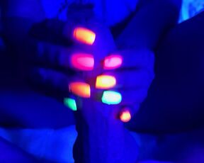 Black light glowing nail handjob