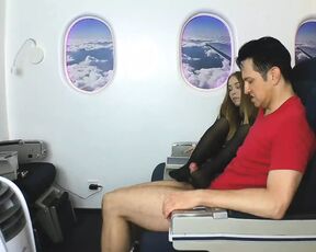 Stewardess gives nylon footjob in plane!