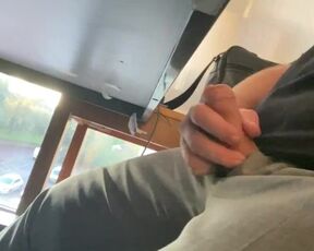 Boss plays with his cock under the desk